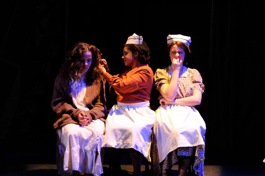 A 'madwoman' and her attendants on "Pullman Car Hiawatha" 
